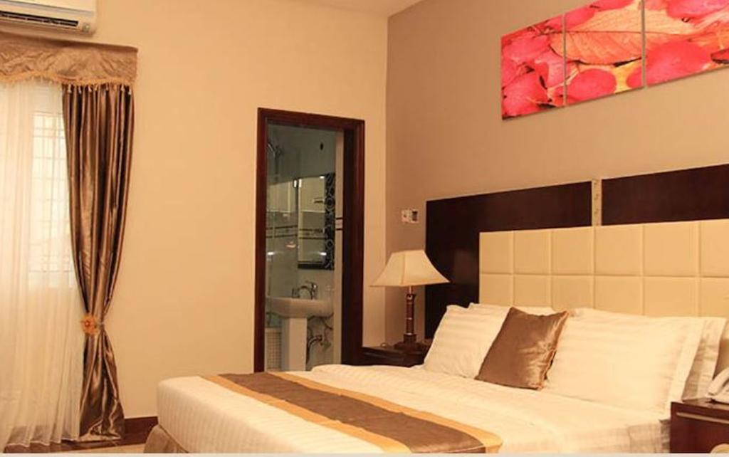 Grandbee Suites Ikeja Habitación foto